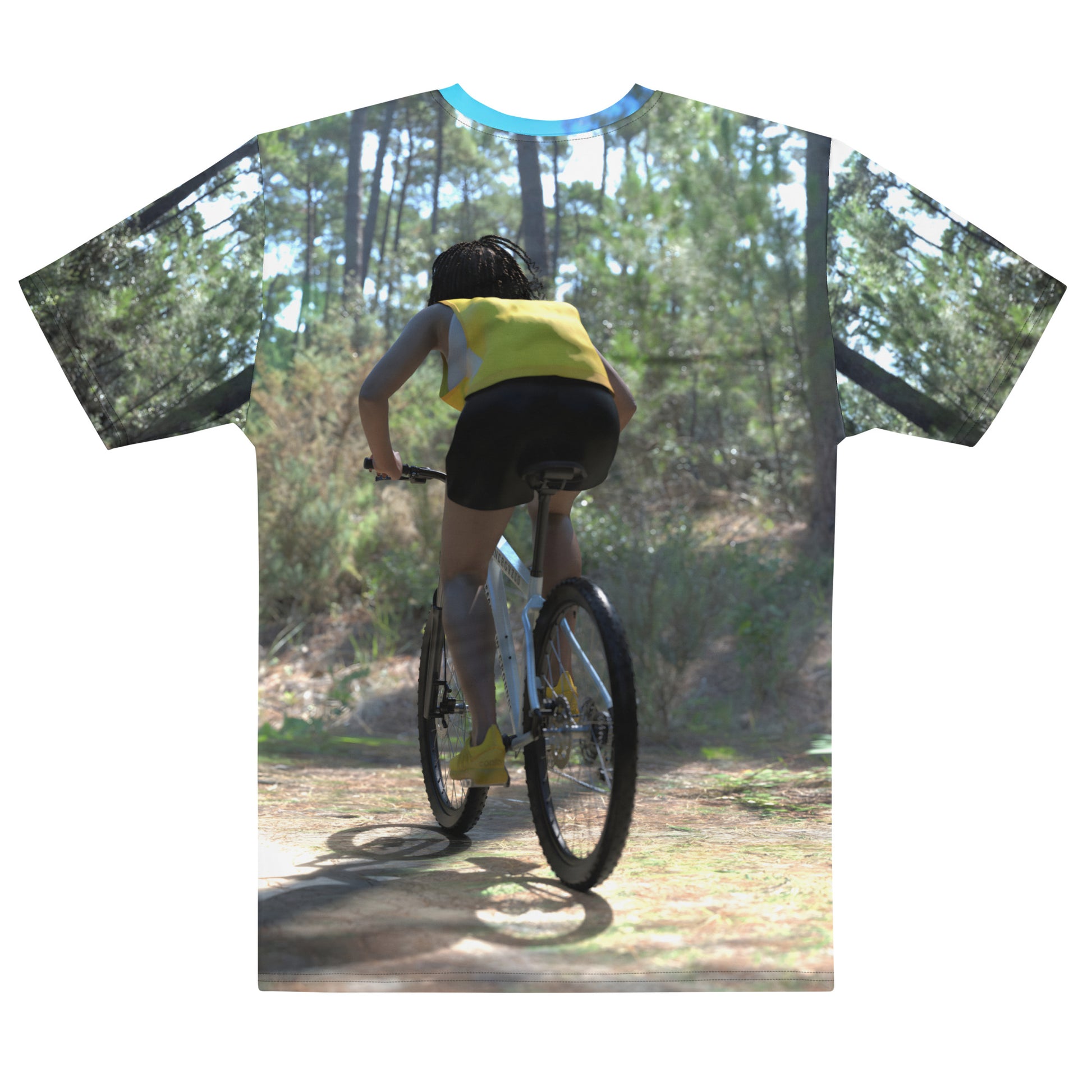 An all over print t-shirt of a black woman riding a bicycle on a trail in the woods.