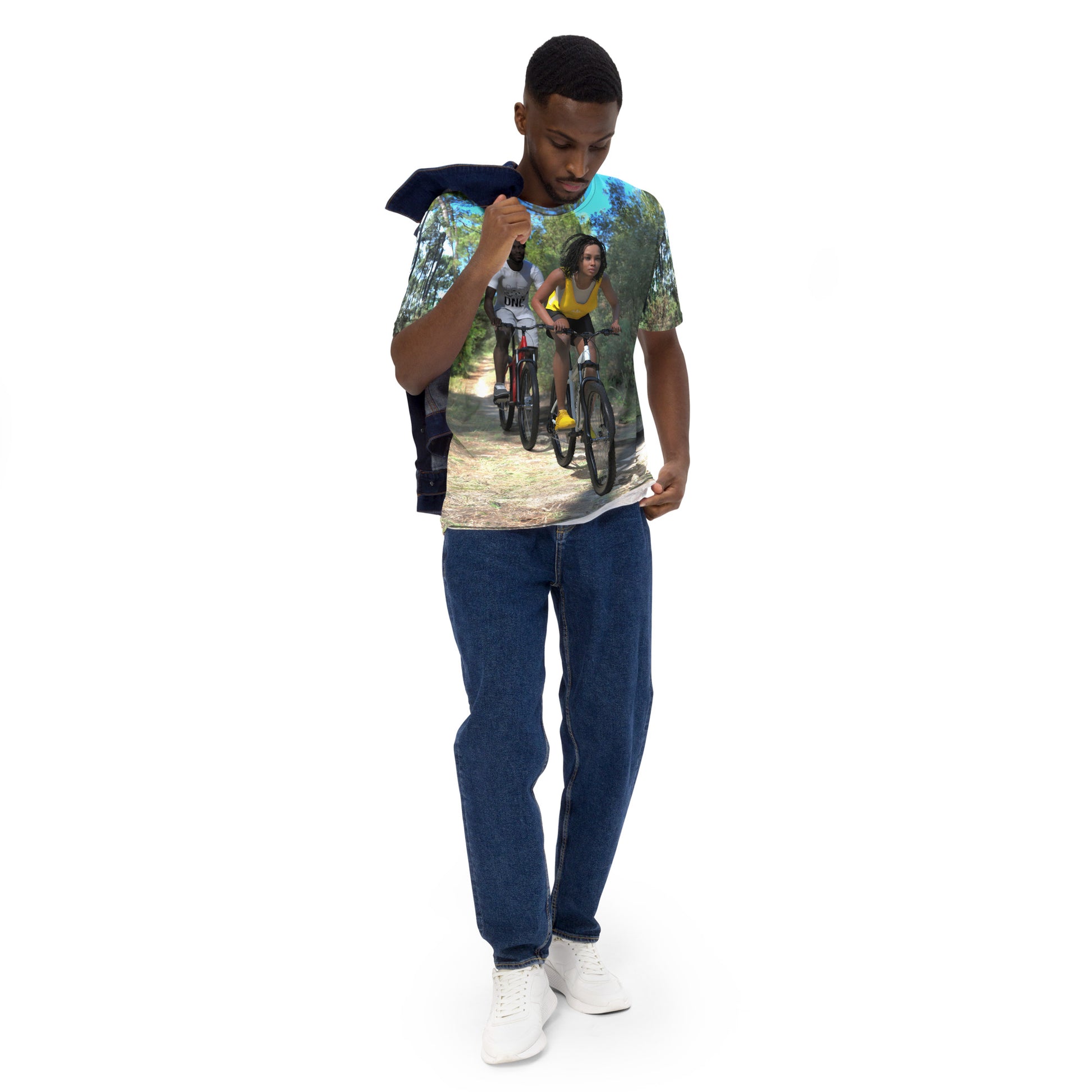 An all over print t-shirt of a black man and woman riding bicycles on a trail in the woods.