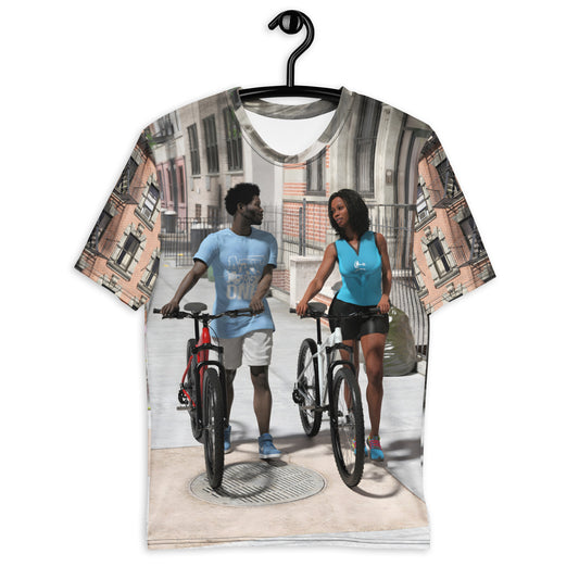 Artwork on a t-shirt of a black man and woman walking their bikes on a Brooklyn sidewalk.