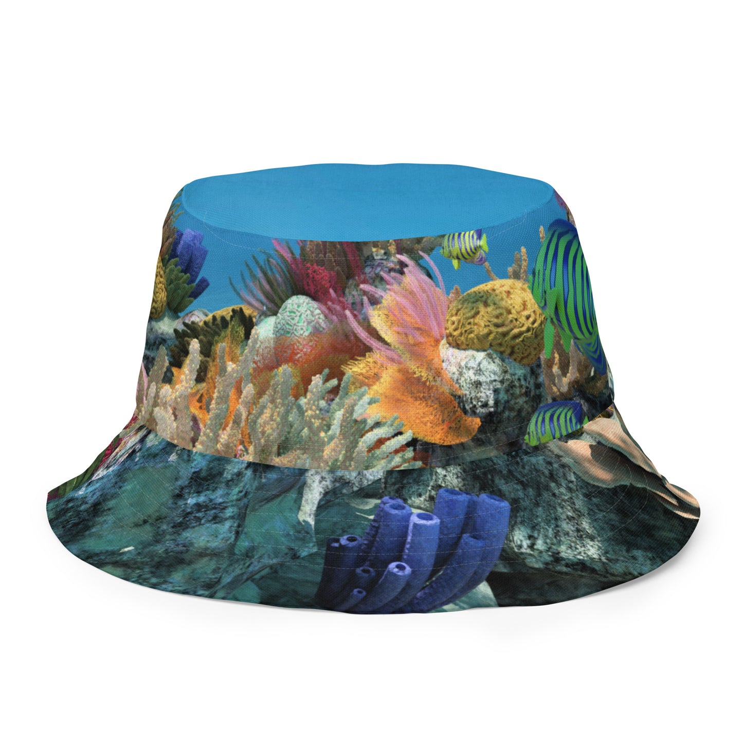 A reversible bucket hat with an image of ocean fish and a coral reef underwater.