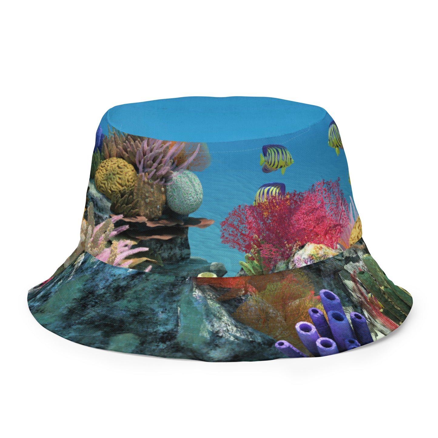 A reversible bucket hat with an image of sharks and coral reef underwater.