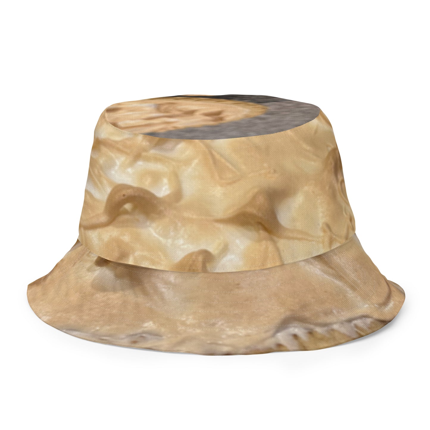 A reversible bucket hat with an image of lemons and a lemon meringue pie.