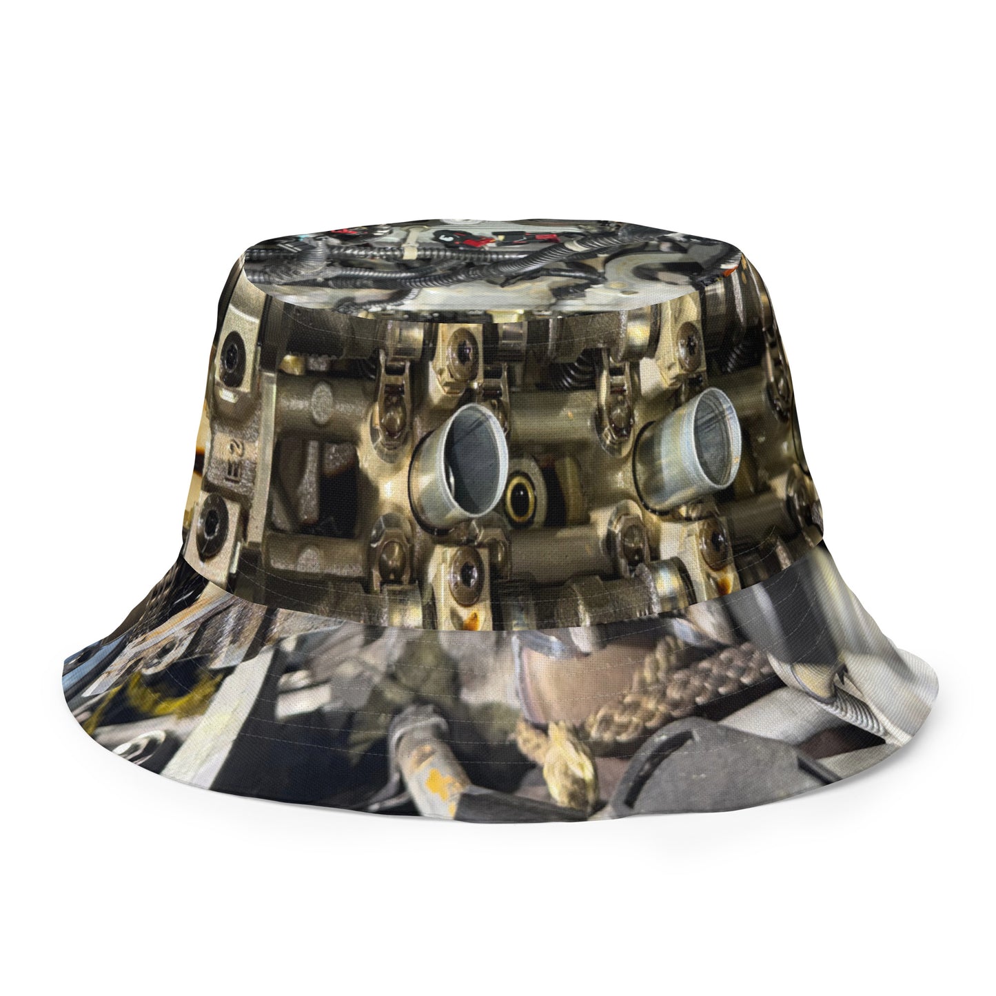 A reversible bucket hat with an image of internal parts of a motor.