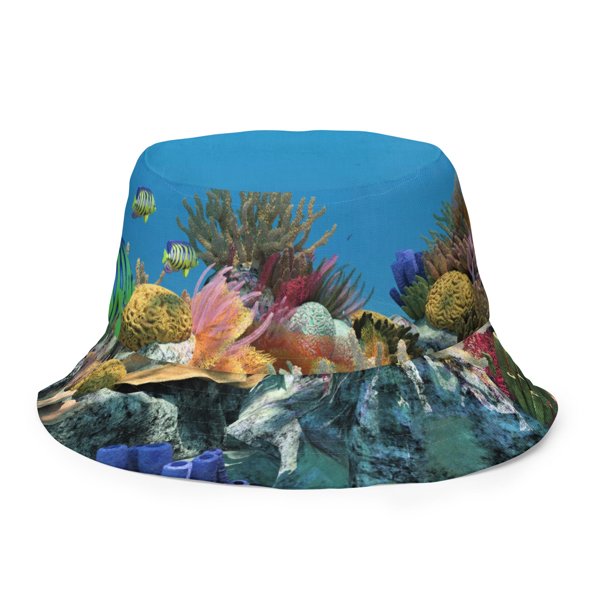 A reversible bucket hat with an image of sharks and coral reef underwater.