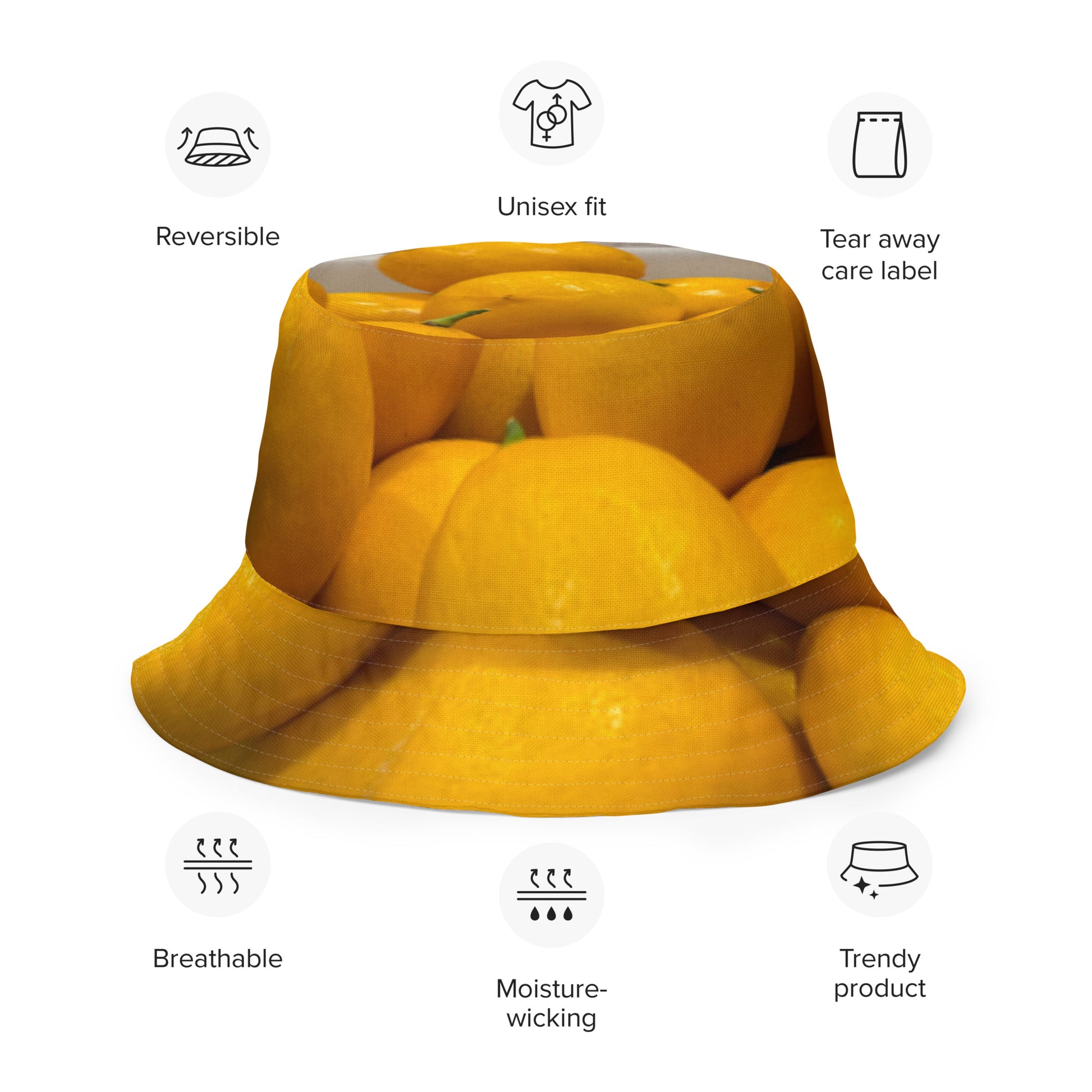 A reversible bucket hat with an image of lemons and a lemon meringue pie.