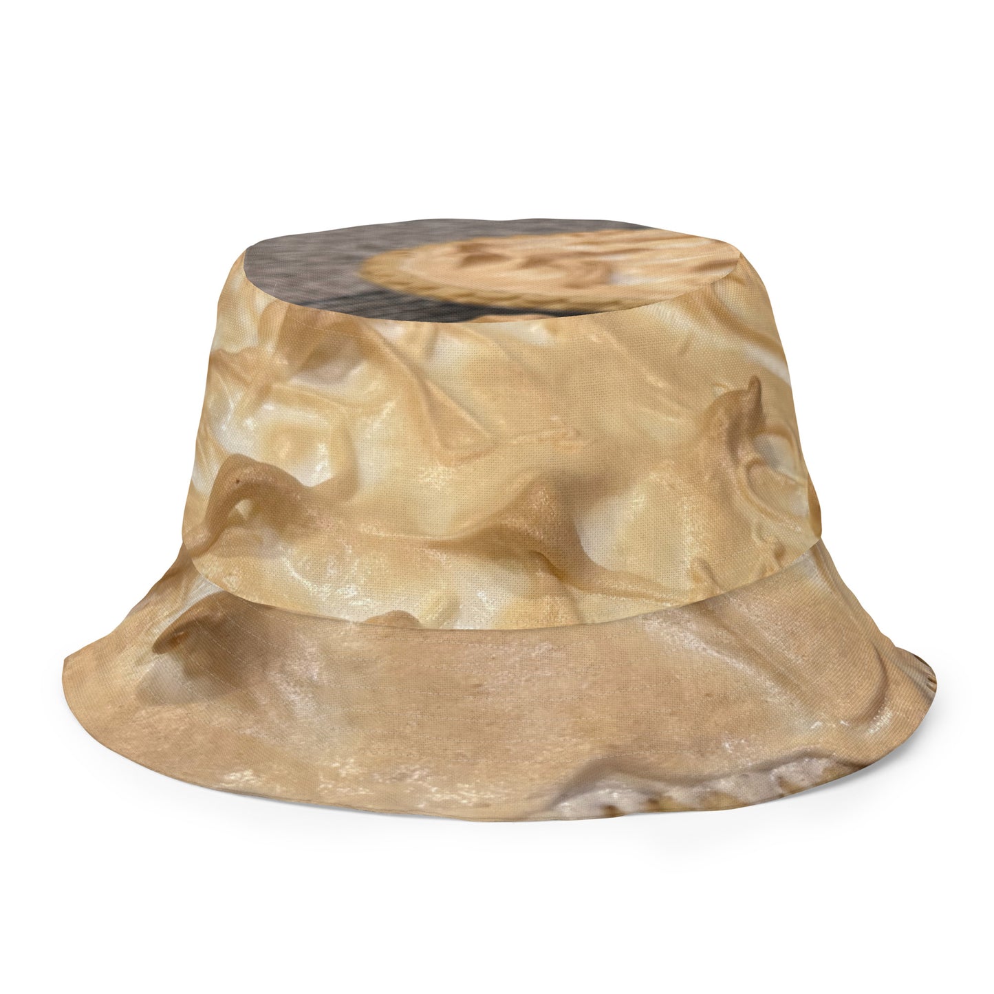 A reversible bucket hat with an image of lemons and a lemon meringue pie.