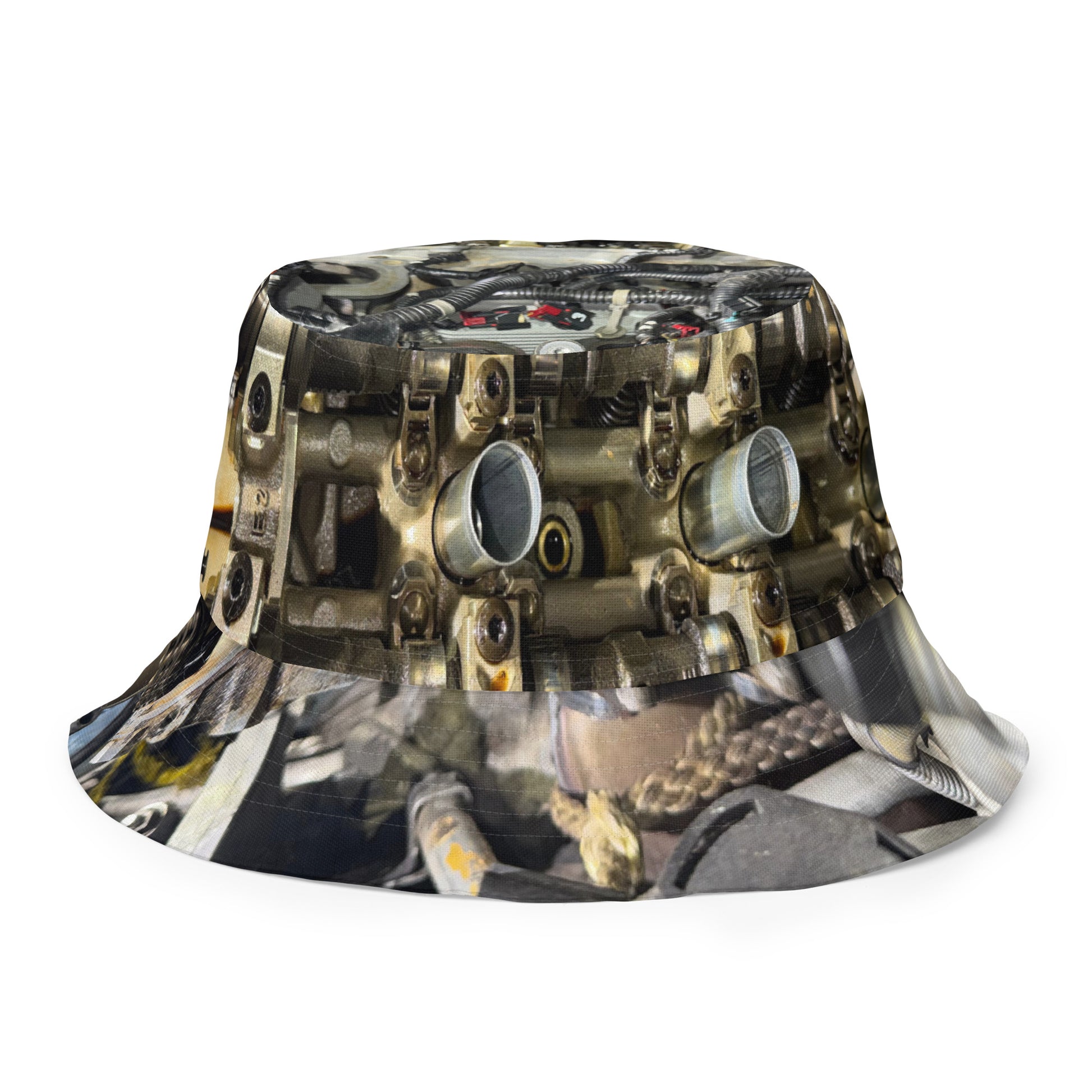 A reversible bucket hat with an image of internal parts of a motor.