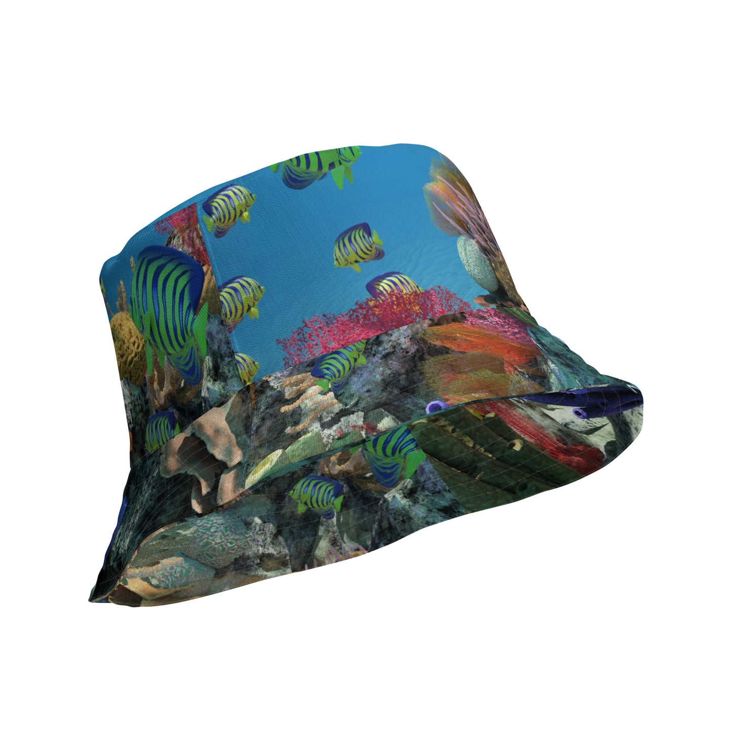 A reversible bucket hat with an image of ocean fish and a coral reef underwater.