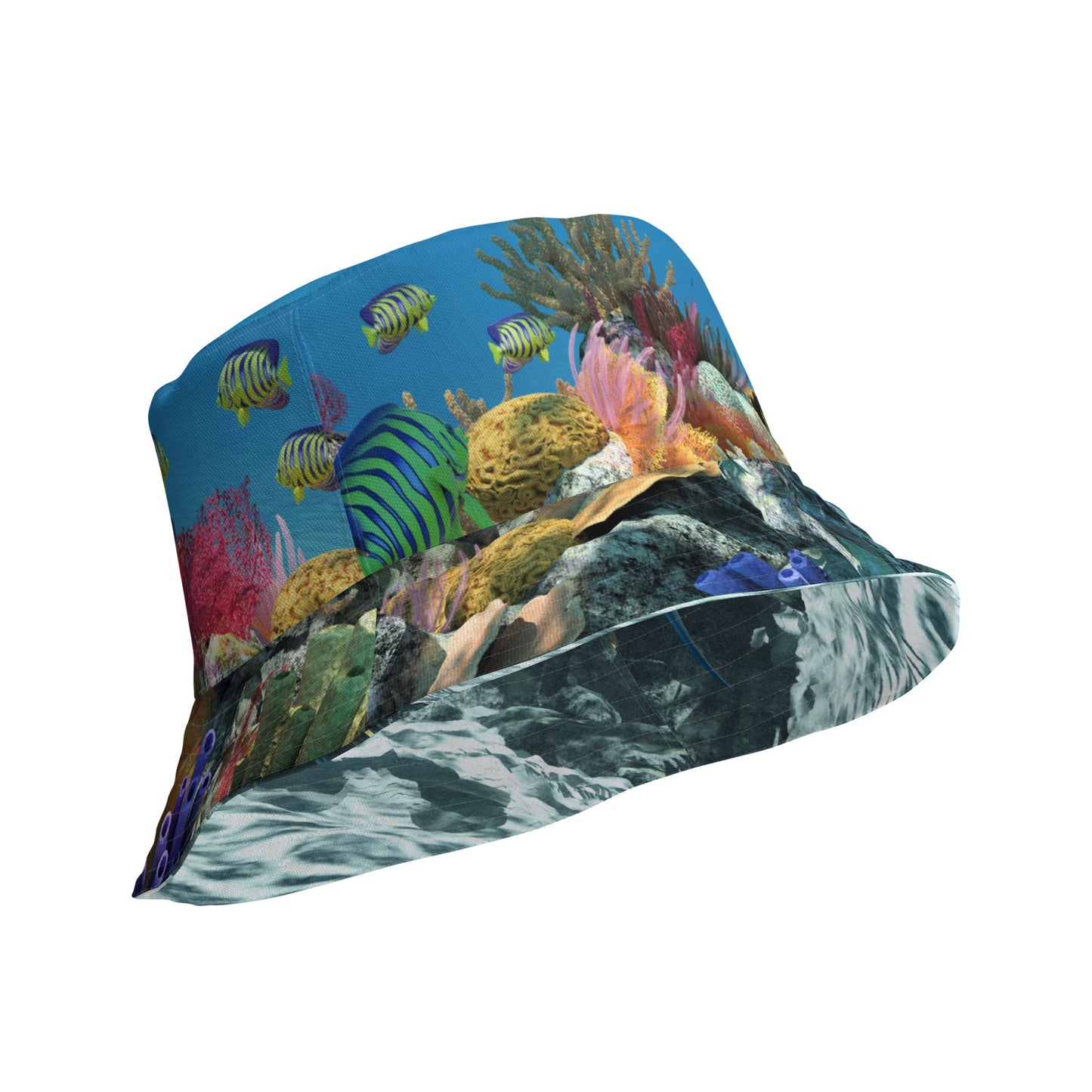 A reversible bucket hat with an image of sharks and coral reef underwater.