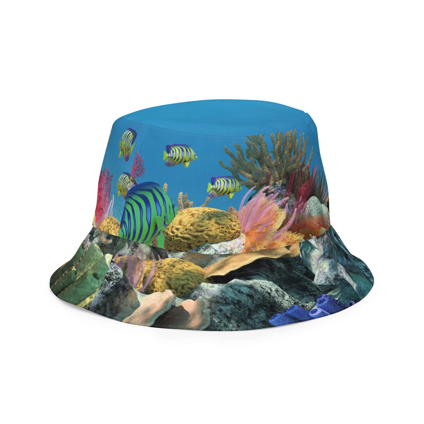 A reversible bucket hat with an image of sharks and coral reef underwater.