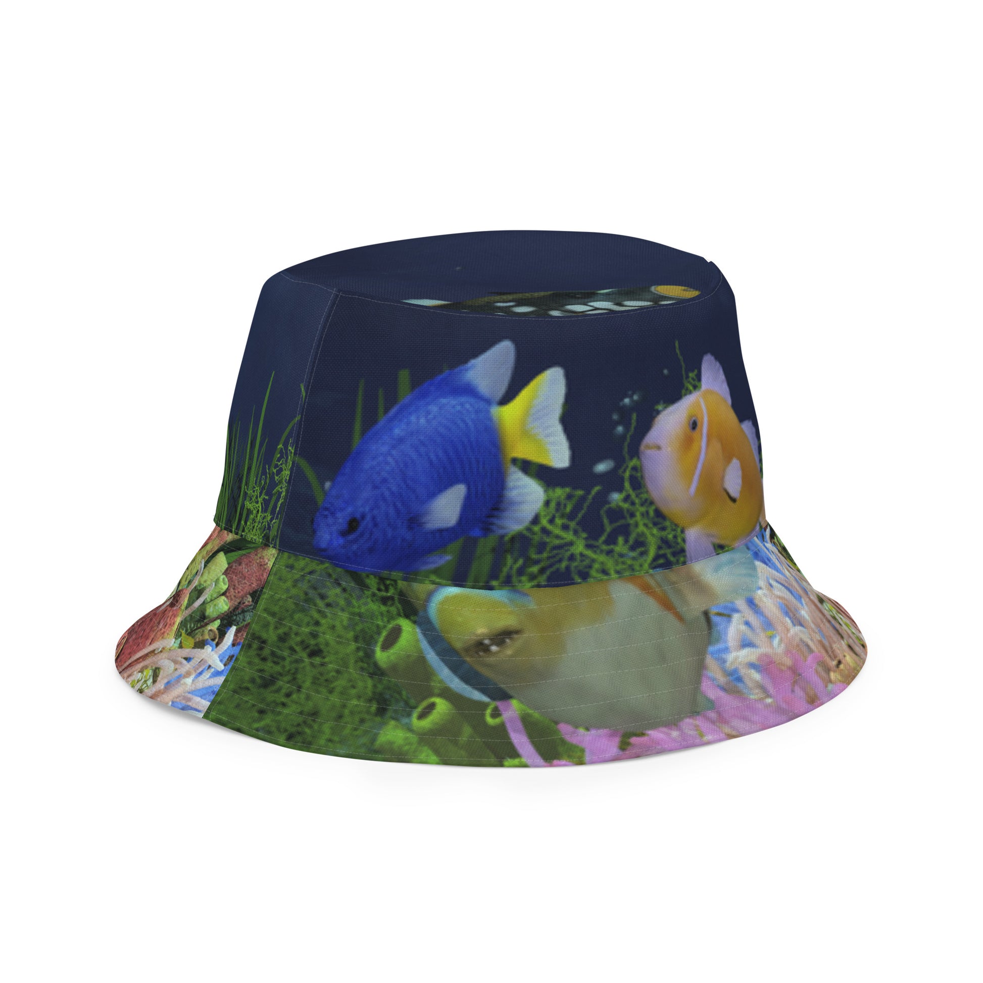 A reversible bucket hat with an image of dark ocean water with fish and a coral reef underwater.