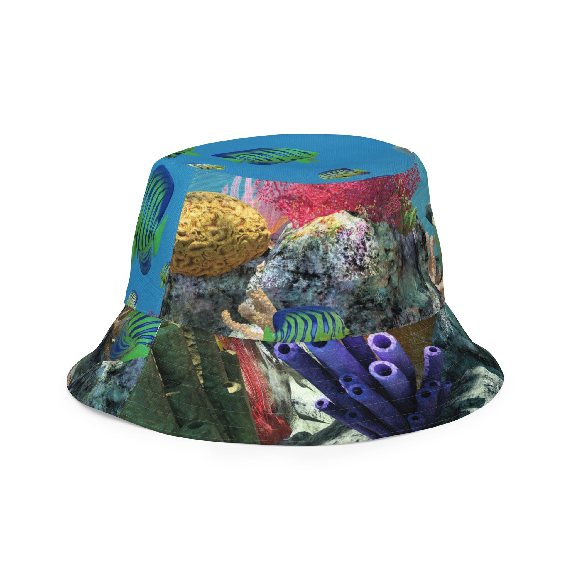 A reversible bucket hat with an image of ocean fish and a coral reef underwater.