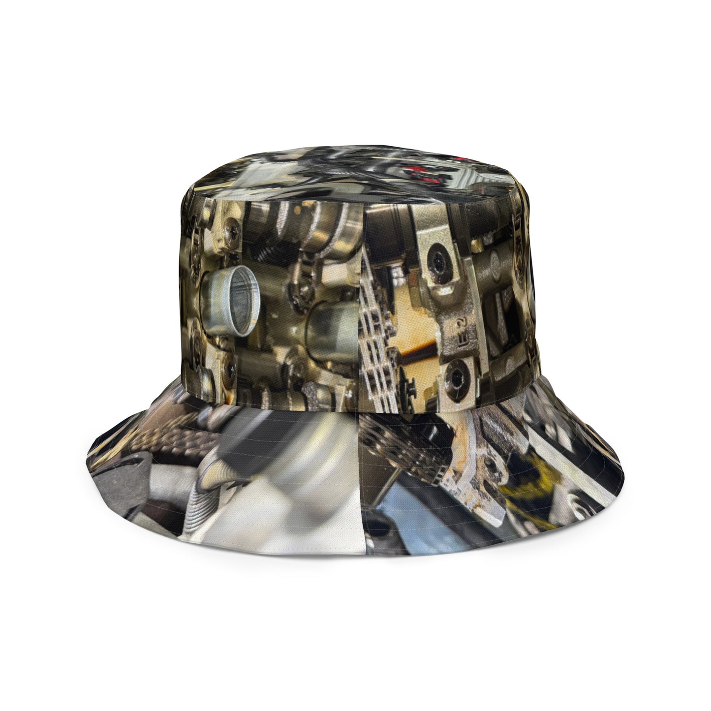 A reversible bucket hat with an image of internal parts of a motor.