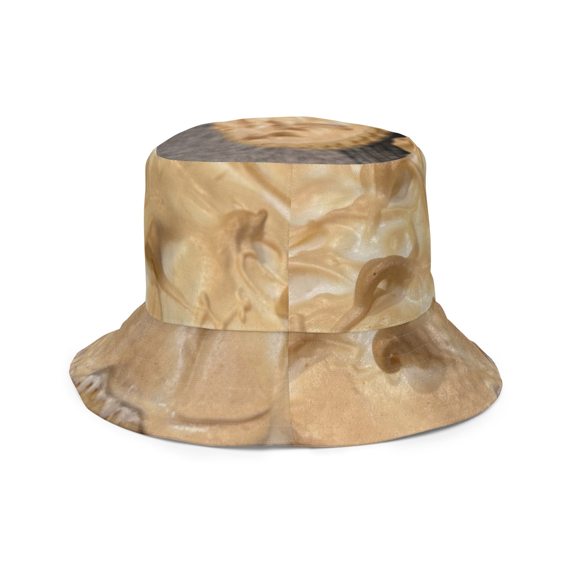 A reversible bucket hat with an image of lemons and a lemon meringue pie.